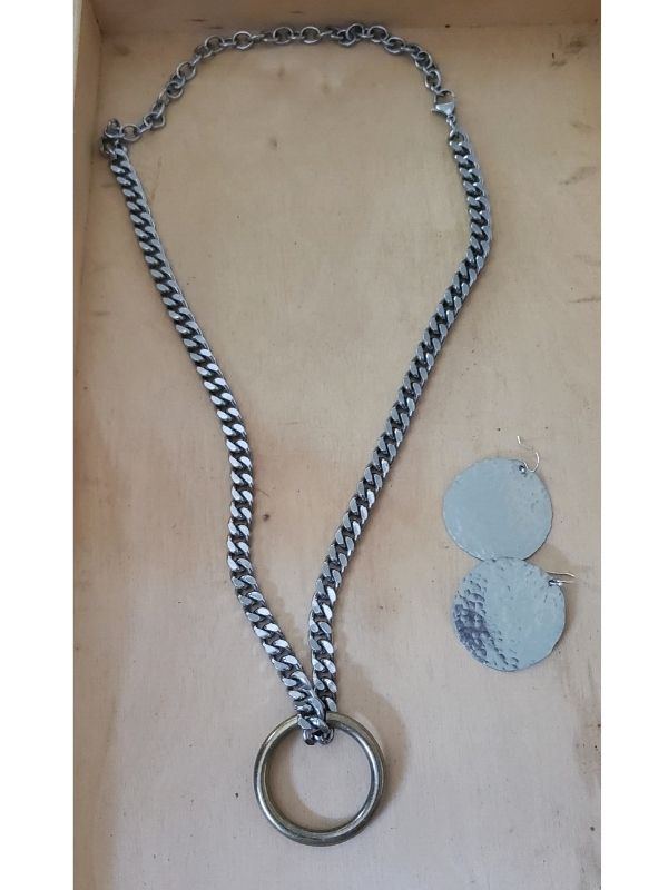 thick silver chain statement necklace and big silver disc earrings